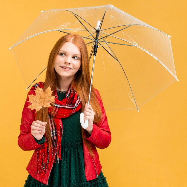 Beautiful model posing with umbrella