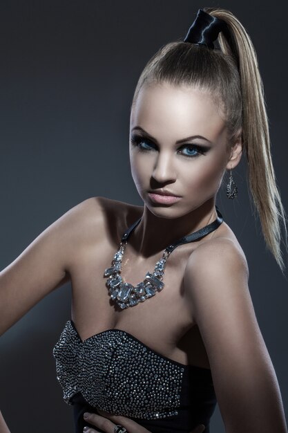 Beautiful model with ponytail and makeup