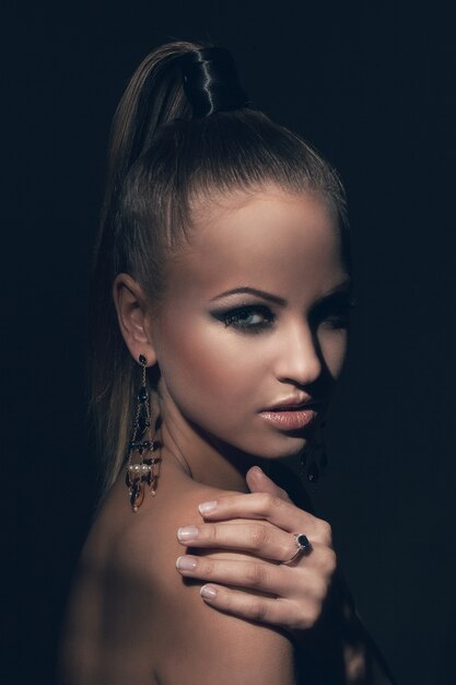 Beautiful model with ponytail and makeup