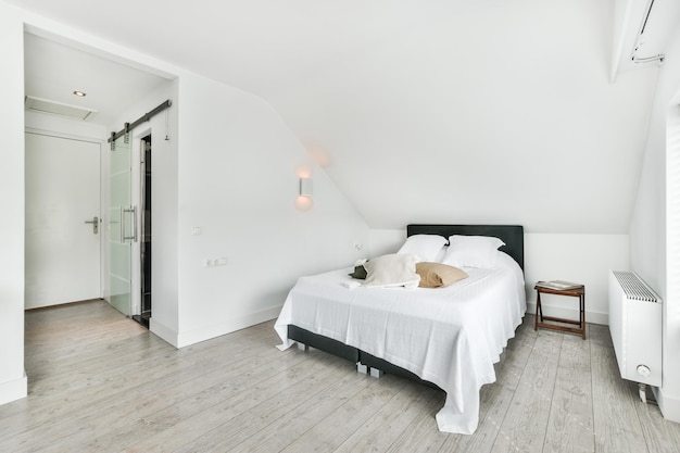 Beautiful modern bedroom in white colors