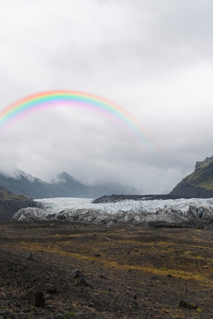 Free photo beautiful natural landscape with rainbow