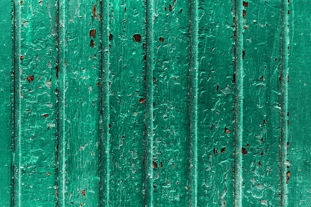 Beautiful Old Antique Dark Wooden Texture Surface Background Backdrop. Old Turquoise Stripes Door. Copy Space.
