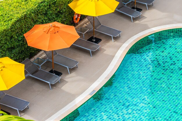 Beautiful outdoor swimming pool in hotel resort for holiday vacation