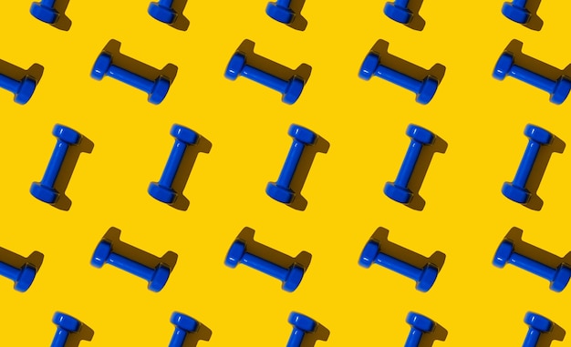 A beautiful pattern of blue fitness dumbbells on a yellow background. wallpapers for your phone or computer
