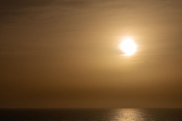 Beautiful Photo of the Sea with Golden Sun | Free Download
