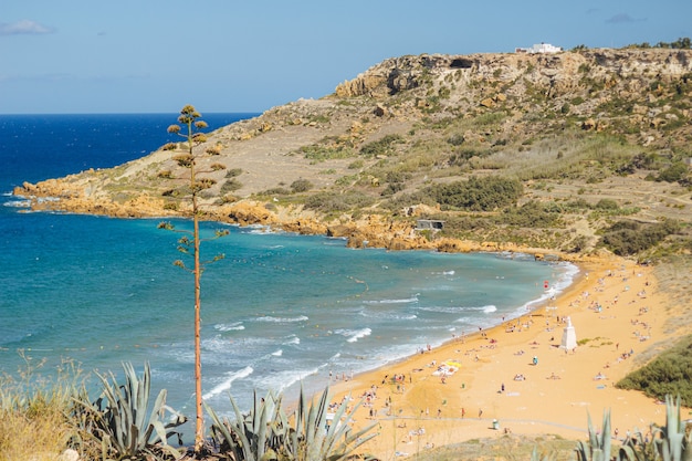 Beautiful picture of a coastline with a lot of people