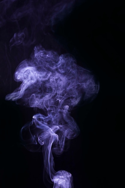 Beautiful purple smoke effect pattern against black backdrop