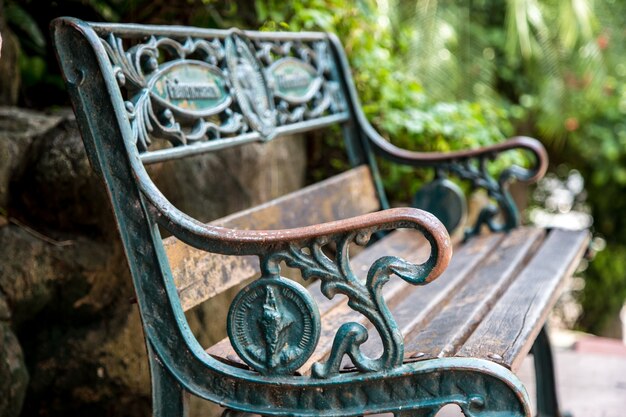 beautiful retro bench with wrought-iron lace handles