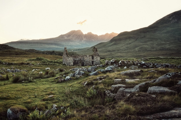 Beautiful rocky field with destroyed building