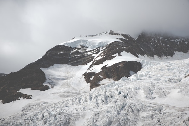 Beautiful scenery of clear white snowy mountains and hills