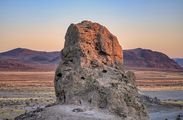Beautiful scenery of a pinnacle at sunrise in the desert