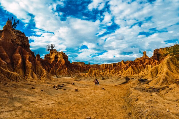 Beautiful scenery of the red rocks in the Tatacoa Desert in Colombia under the cloudy sky