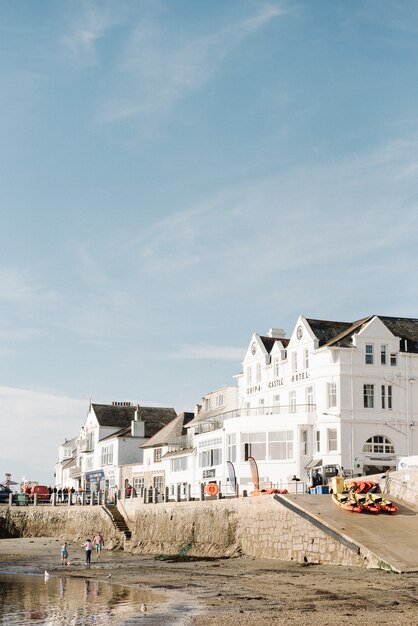 Beautiful scenery of white apartments on the waterfront site under a beautiful blue sky