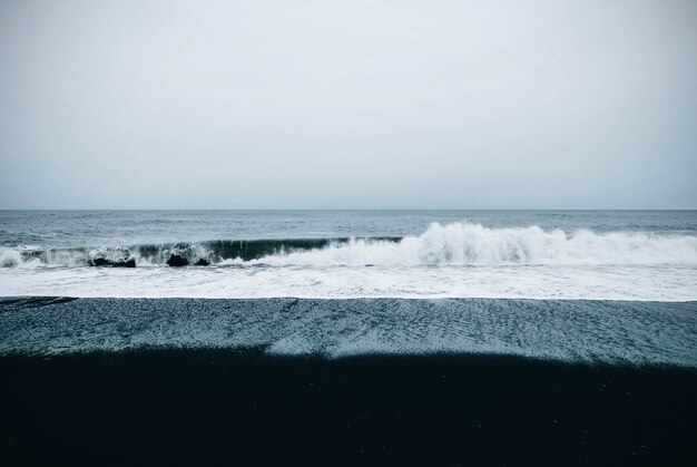 Beautiful scenic view of the sea under a cloudy gloomy sky