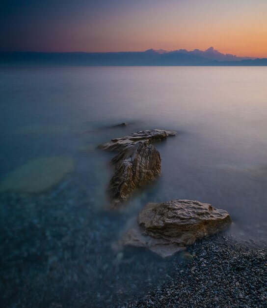 Beautiful seascape at sunset with rock formations in the water