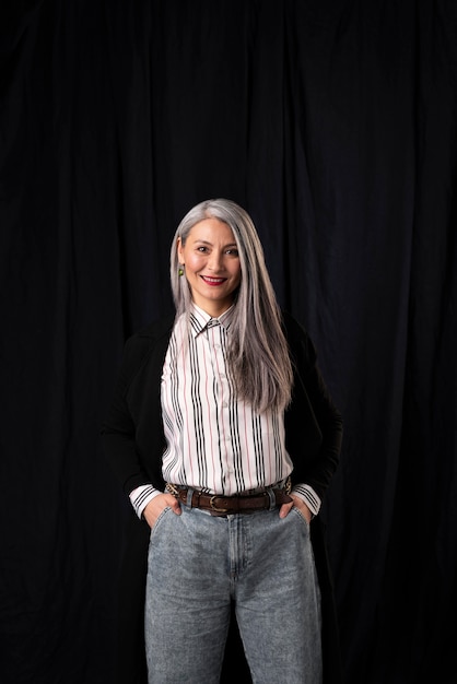 Beautiful senior woman portrait in formal clothes