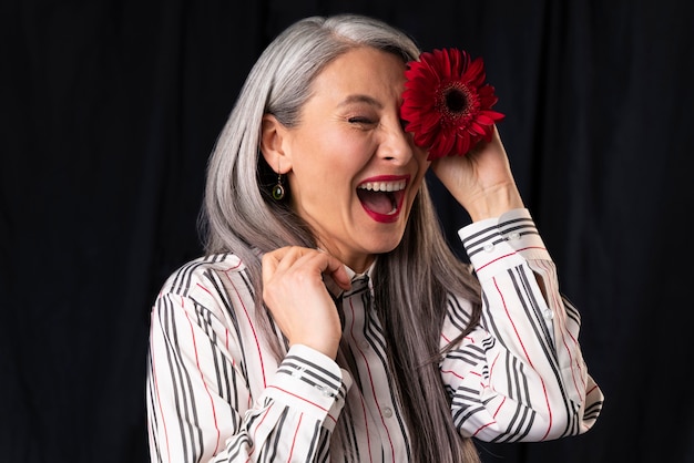 Free photo beautiful senior woman portrait laughing