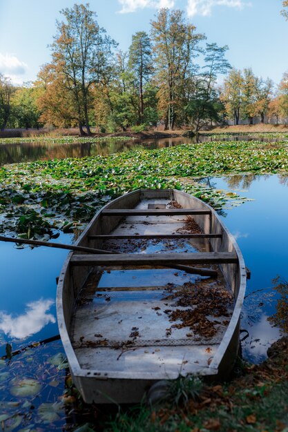 beautiful shot of a boat in the lakeside of cesky krumlov city of czech republic