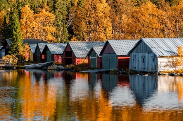 Beautiful shot of boathouses in Autumn