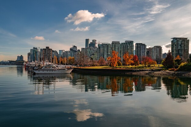 Beautiful shot of the boats parked near the Coal Harbour in Vancouver