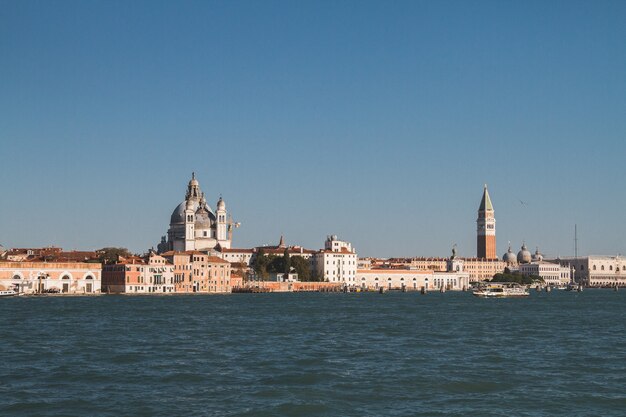 Beautiful shot of buildings in the distance in Venice Italy Canals