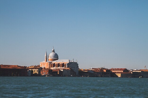 Beautiful shot of buildings in the distance at Venice Italy Canals