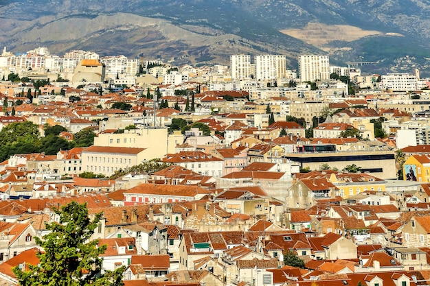 Beautiful shot of buildings with mountains in the distance in Croatia, Europe