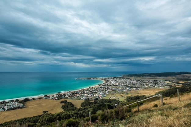 Beautiful shot of a coastal city with amazing sky