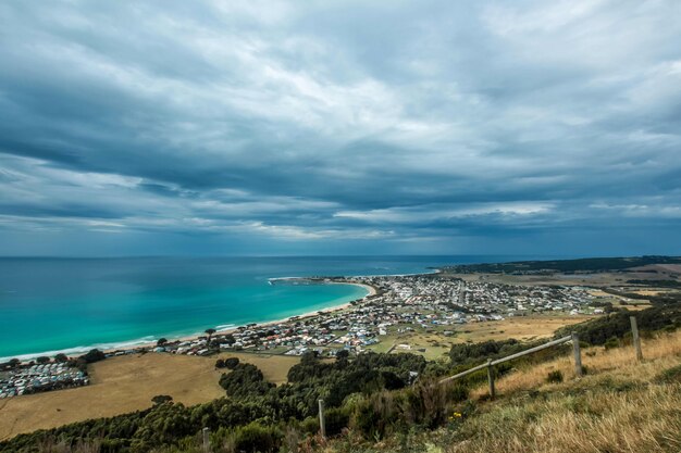 Beautiful shot of a coastal city with amazing sky