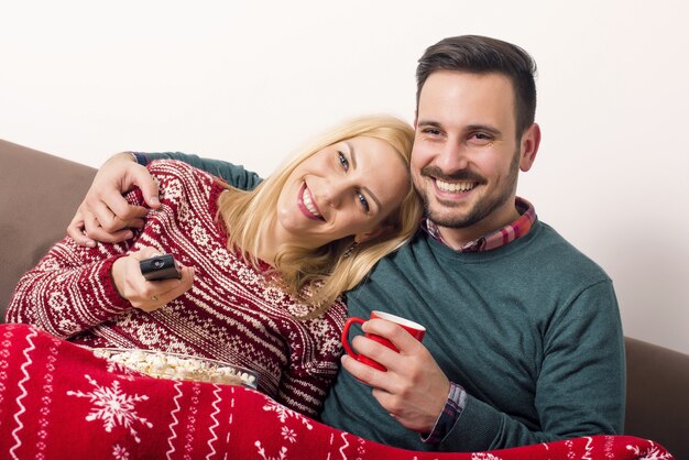 Beautiful shot of a couple hugging on Christmas holidays