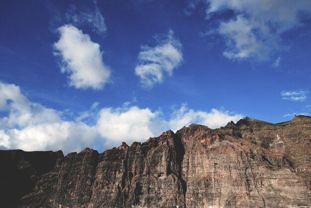 Beautiful shot of the high rock formations and cliffs near the sea