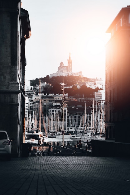 Beautiful shot of a port with lots of docked boats in the water in Marseille, France