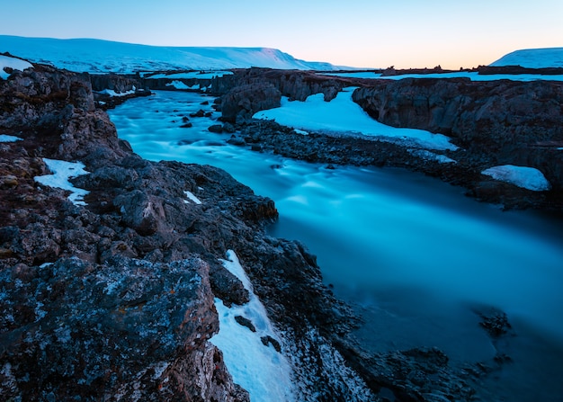 Beautiful river in a rocky field – Free Stock Photo