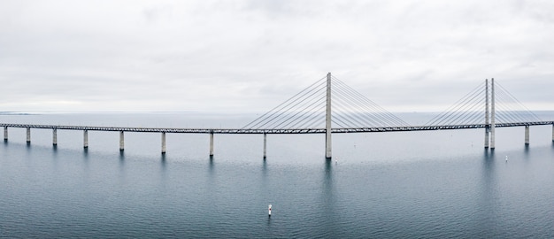 Free photo beautiful shot of a self-anchored suspension bridge on a blue sea