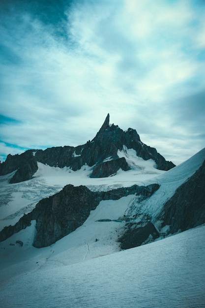 Beautiful shot of snowy and rocky steep mountains and hills