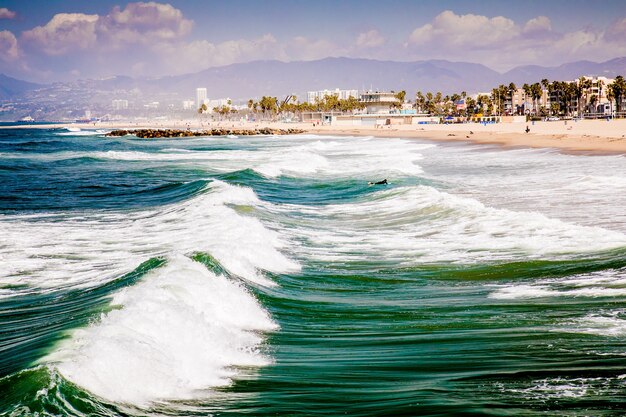 Beautiful shot of the Venice Beach with waves in California