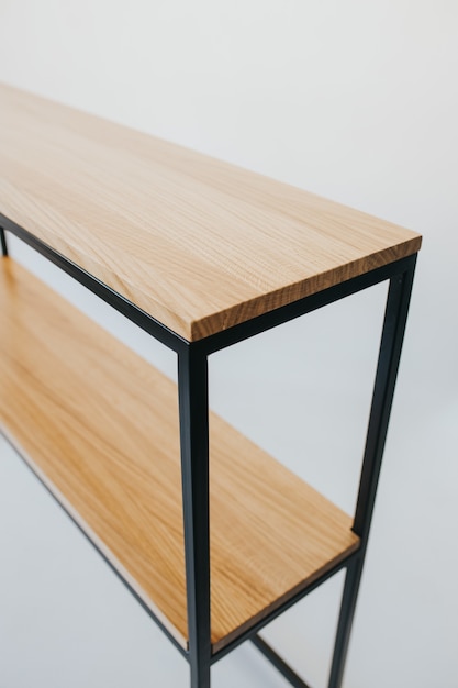 Beautiful shot of a wooden modern shelf isolated on a white background