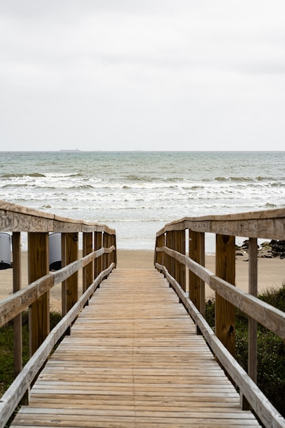 Beautiful shot of a wooden walkway on the beach
