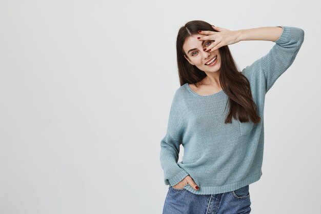 Beautiful smiling woman looking camera excited