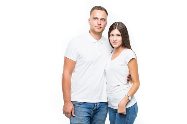 Beautiful smiling young couple isolated on white background