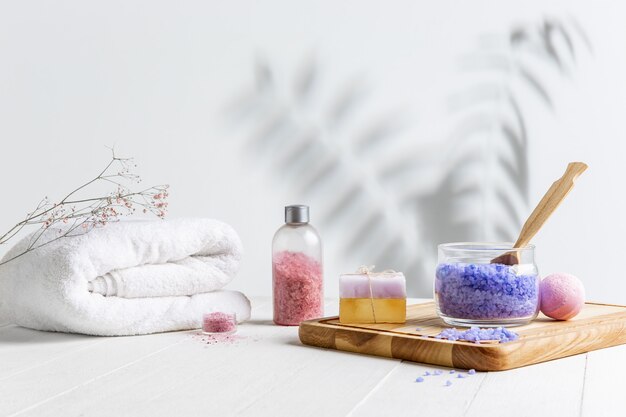 Beautiful spa composition on massage table in wellness center, copyspace