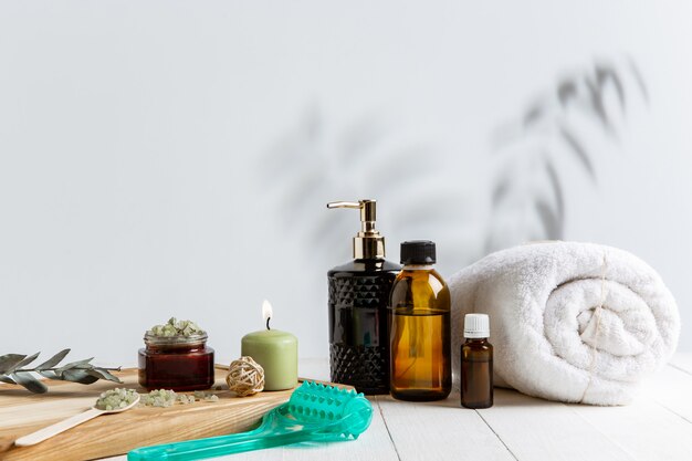 Beautiful spa composition on massage table in wellness center, copyspace