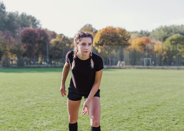 Beautiful sportive girl looking away