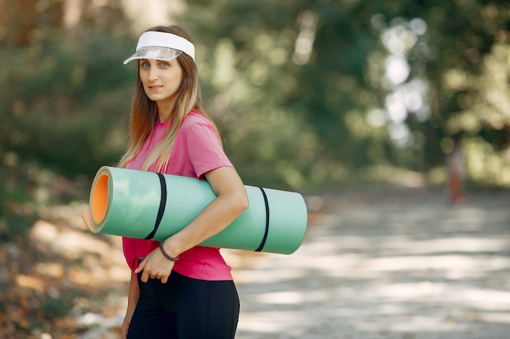 Free Photo beautiful sports girl in a summer park