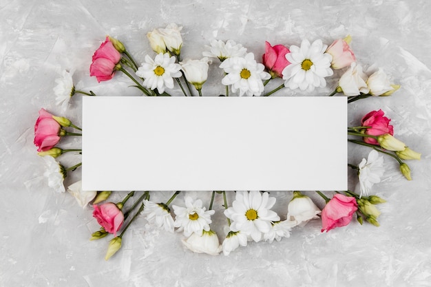 Beautiful spring flowers composition with empty frame
