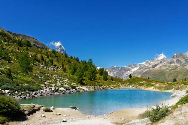 Premium Photo Beautiful Swiss Alps Landscape With Stellisee Lake And Matterhorn Mountain Premium Photo Beautiful Swiss Alps Landscape With Stellisee Lake And Matterhorn Mountain