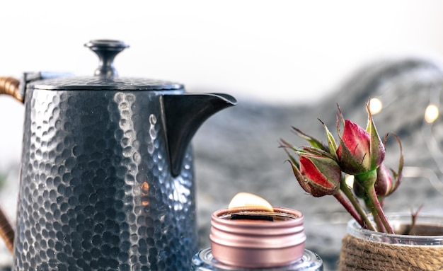 Free photo beautiful textural teapot on a blurred background in a cozy home interior