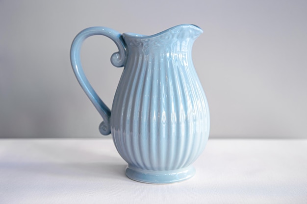 Free photo beautiful textured blue jug for drinks closeup