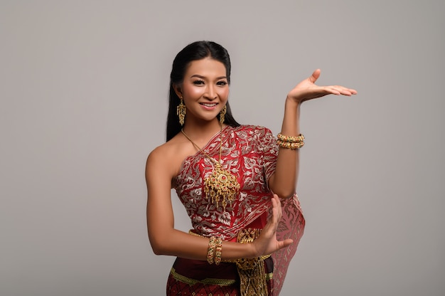 Beautiful Thai woman wearing Thai dress and Thai dance