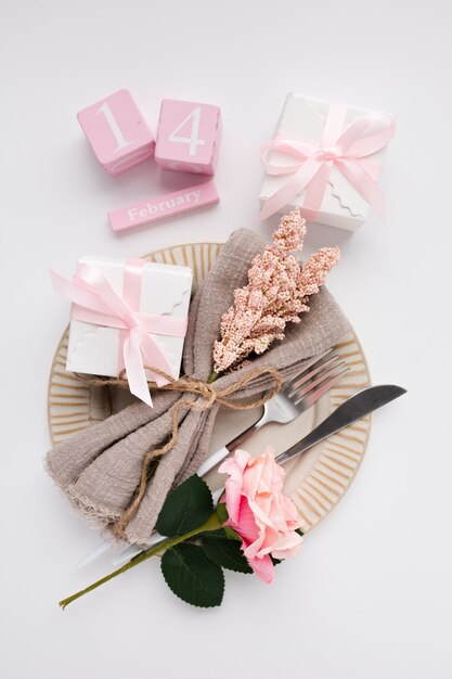 Beautiful top view table setting for Valentines on white